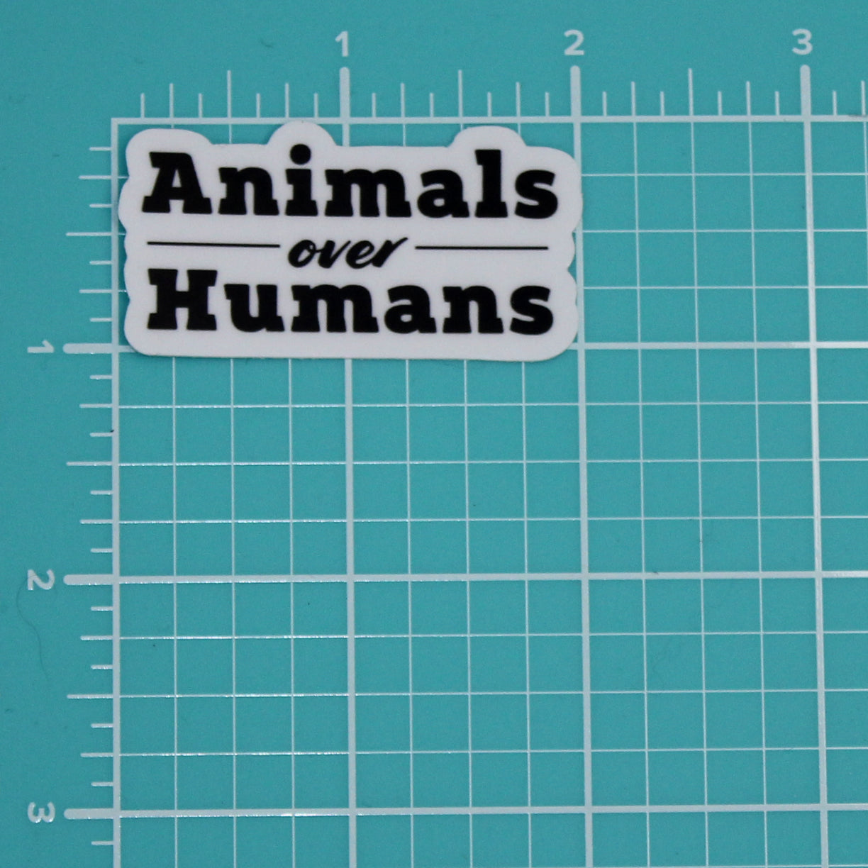 ANIMALS OVER HUMANS STICKER